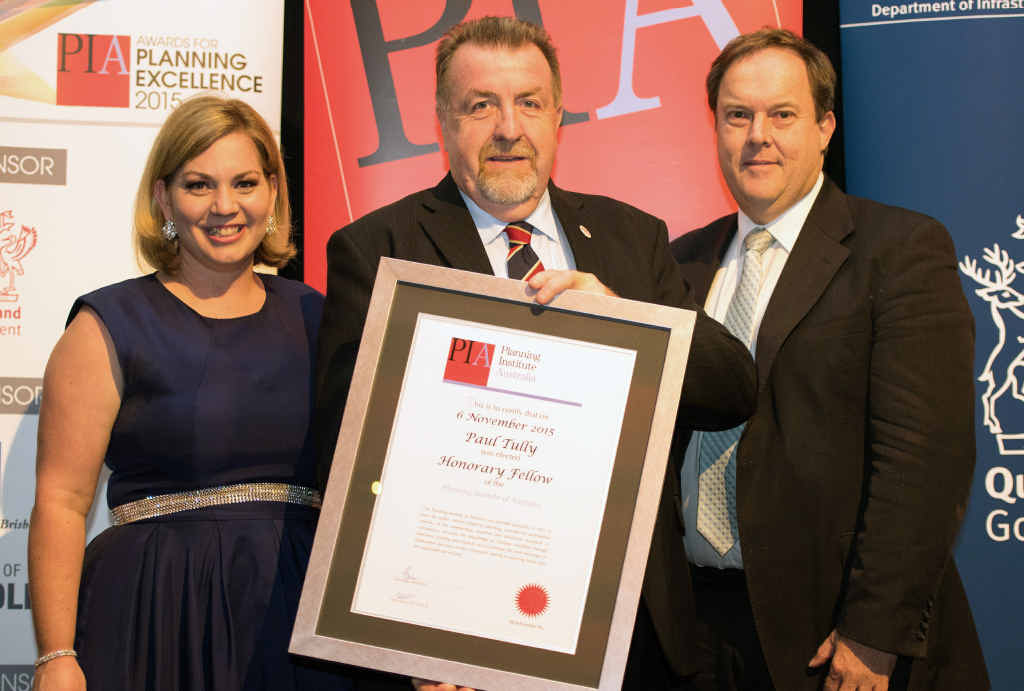 RECOGNITION: PIA State President Kate Isles and National Board Director Darren Crombie award Cr Paul Tully an Honorary Fellow. RECOGNITION: PIA State President Kate Isles and National Board Director Darren Crombie award Cr Paul Tully an Honorary Fellow.